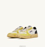 Autry γυναίκες super vintage χαμηλά sneakers σε δερμάτινο λευκό μαύρο και κίτρινο 04FXF202 - Image 2