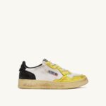 Autry γυναίκες super vintage χαμηλά sneakers σε δερμάτινο λευκό μαύρο και κίτρινο 04FXF202